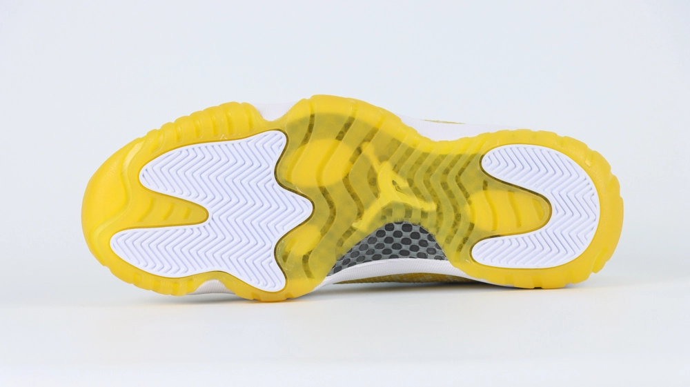 jordan 11 retro low yellow snakeskin (women’s)