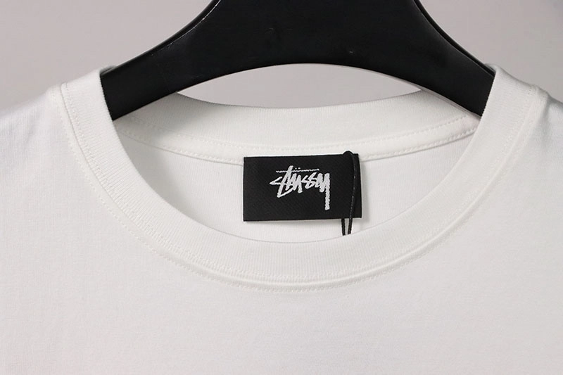 stussy doll slogan print t-shirt