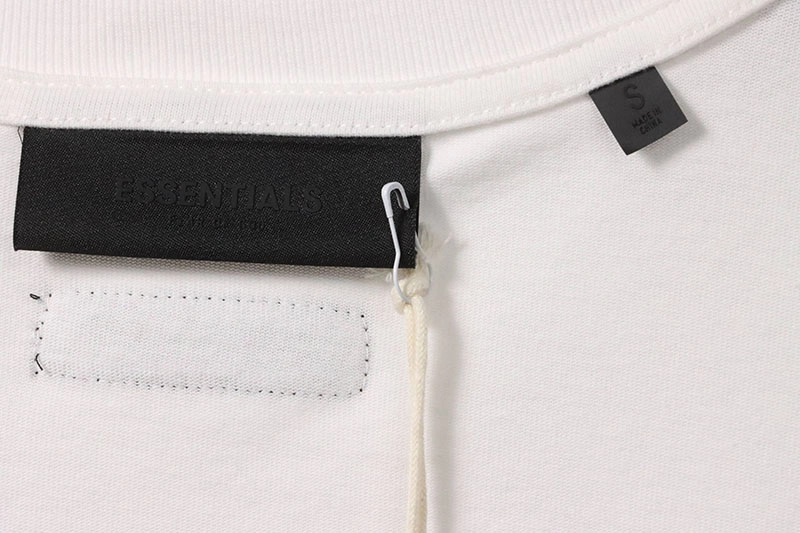 fear of god essentials damaged letter t-shirt